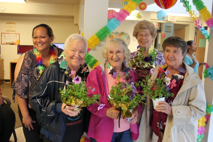 Clare House thanking Meal Team Providers in an annual Lu'au. Thank you!
